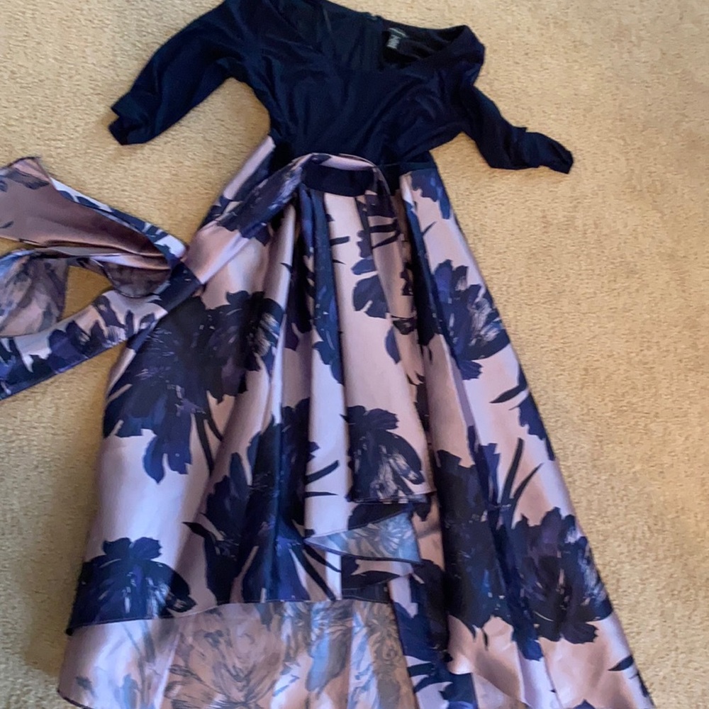 The top is navy and the skirt is lilac and Navy